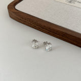 Tiny Twinkle Silver Studs